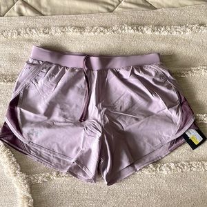 Purple under armour shorts size medium.